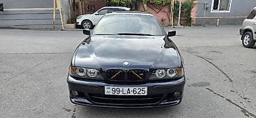 a class mercedes: BMW 5 series: 2.5 l | 1999 il Sedan — 5
