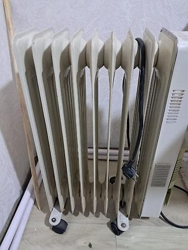 Yağlı radiator (elektrik isitmə cihazı) - Tip: Elektriklə işləyən