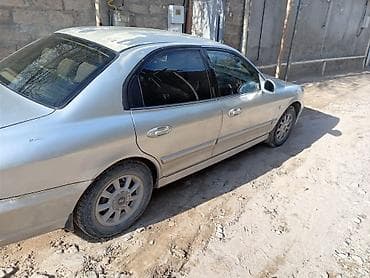 suktur: Hyundai Elantra (J3) sedan, gümüşü rəng. - Kuzov: 4 qapılı sedan — 7