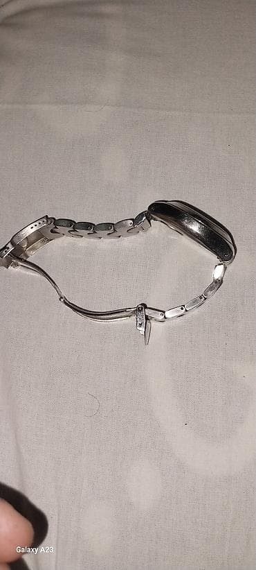swatch: Swhec tam orginal saatir 1997 buraxilshidir super saatdir qolda super — 4