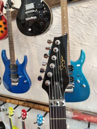 gitara çantası: Elektro-gitara Model:Smiger L-G8 Simlərin sayı: 6 Üst:Deadwood — 2