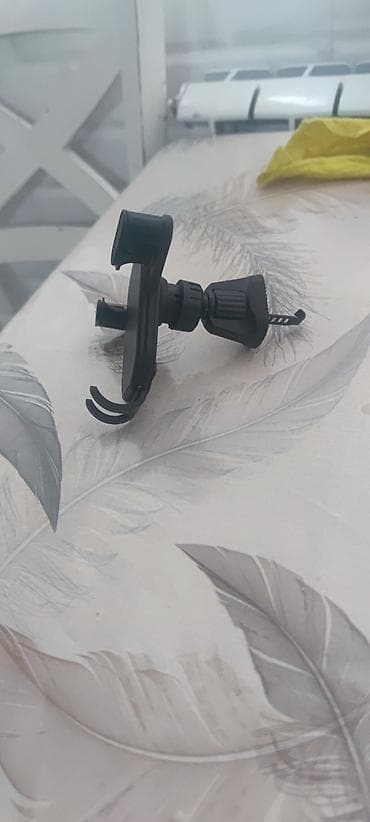 Avtomobil üçün hava çıxışına quraşdırılan telefon tutacağı -