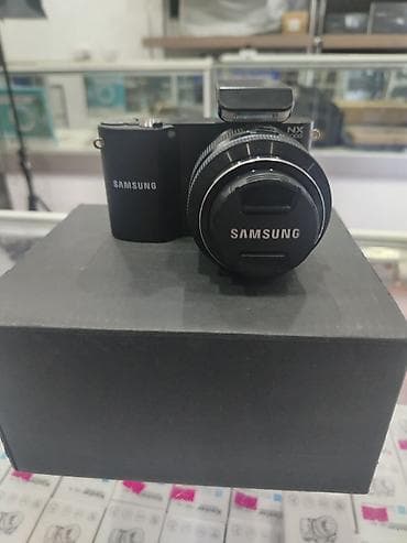 isti: Samsung NX1000 hibrid fotoaparat dəsti - Gövdə: Samsung NX1000 (APS‑C — 3