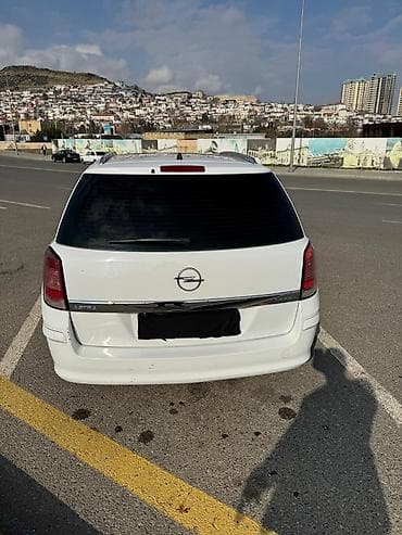 afdomobil: Opel Astra Caravan (Universal) - Kuzzov: universal (Caravan), ağ rəng — 3