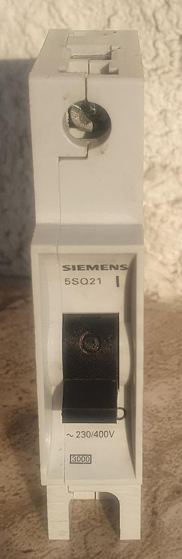 pnevmatik acar: “Siemens” markarlı elektrik avtomat açarları satılır. İçərisində — 2