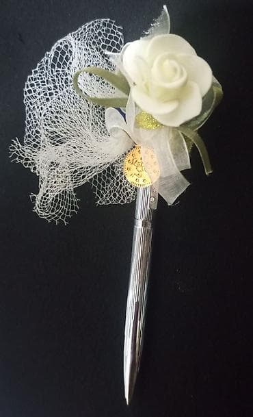 korpu kran: Dekorativ qələm – gümüşü rəngli, döndərmə mexanizmi ilə. Üst hissəsi — 3