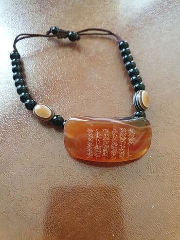 rus papağı: Qolbaq 
браслет — 1