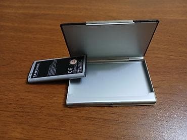 Vizitka qabı,üatü dəri,içi alüminium, təxmini 20ədəd tutar — 2