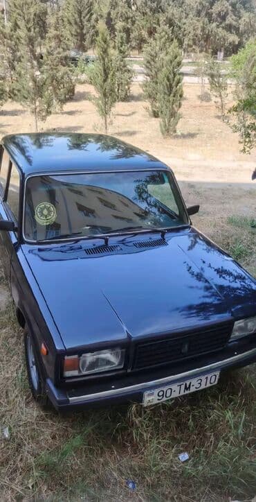 dörd göz maşın: Model: Lada (VAZ) 2107 Kuzov: sedan, tünd mavi rəng Dövlət nömrə — 7