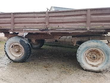 Kənd təsərrüfatı üçün traktor qoşqusu (iki oxlu, meşin bortlu). lapet