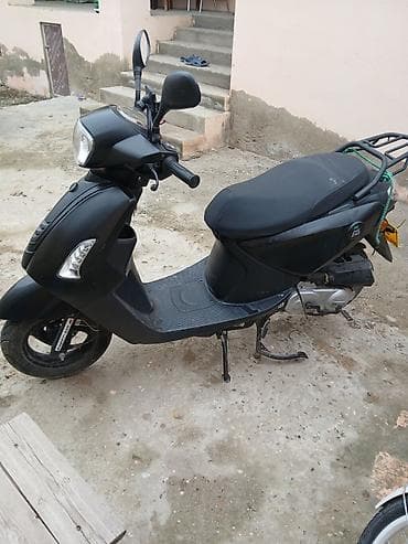 teker lada: Şəhər içi hərəkət üçün kompakt skuter - Rəng: mat qara - Korpus — 3