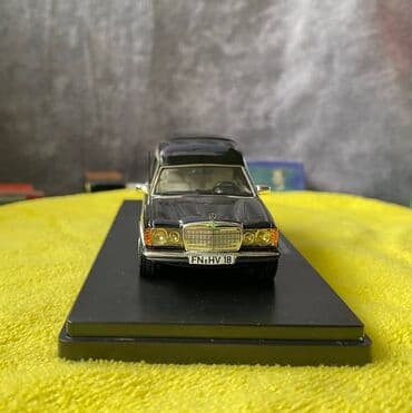 metbex tavan modelleri: Коллекционная модель Mercedes-Benz 200 W123 Hearse black 1982 Schuco — 10