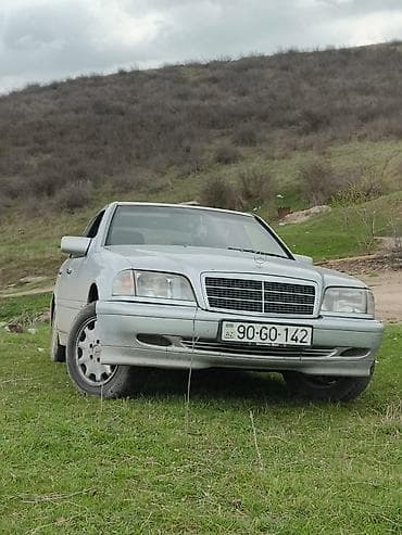 hyundai coupe satilir: Mercedes-Benz C-Class sedan (W202), gümüş rəng. - Kuzov: 4 qapılı — 3