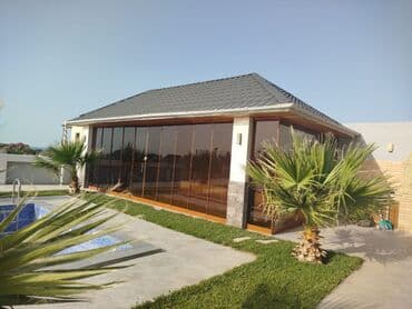 isdilik sistemi: Hər növ sifarişlə şüşə fasad və şüşə qapı sistemlərinin — 1