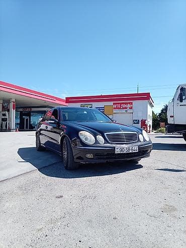 audi tt: Mercedes-Benz E-Class: 2.6 l | 2004 il Sedan — 4