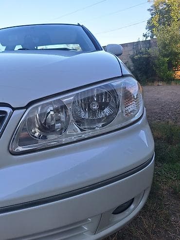 Nissan Bluebird: 1.6 l | 2007 il Sedan — 3