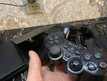 iphone x aksesuar: PlayStation 2 Slim oyun konsolu: 2 pult var 1 eded orjinal digəri isə — 4