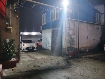 Avtodayanacaq/qaraj sahəsi - Şlaqbaumlu darvazadan girişli, beton