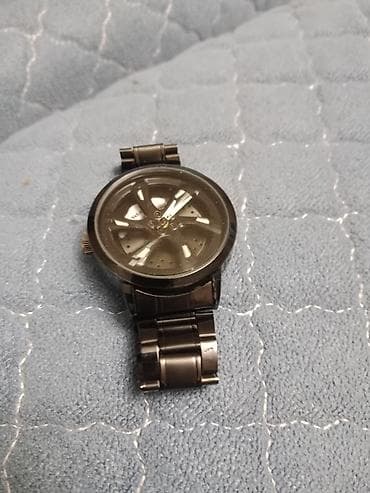 saat patek philippe: Metall qolbaqlı analoq kişi saatı - Rəng: tünd metal/qaraya çalan - — 1