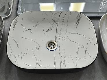 Masaüstü vanna otağı lavabosu - Forma: oval-dördkünc (yumşaq künclü)