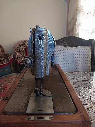 akustik gitara satisi: Mexanik tikiş maşını – çarxlı (ayaq pedalı ilə və ya əl çarxı ilə — 4