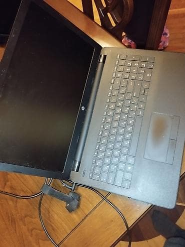 HP noutbuk - Brend: HP (qapaqda loqo) - Korpus: mat qara, toxumalı