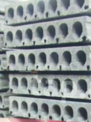 plitələr: Tikinti və ya təmir işləri üçün istifadə olunan beton plitələr. Bu — 7