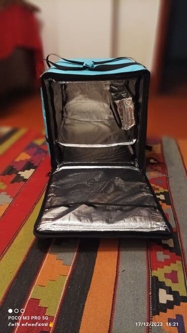 Restoran manqalları: Salam. WOLT kuryer sumkası satılır kurtkası ilə birlikdə. cırığı — 4