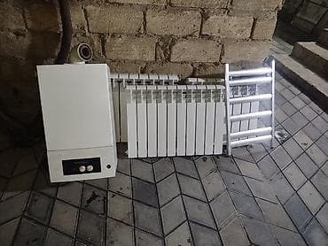 ariston 50 liter: Kombi satılır radyatorla birlikdə kanpirik dəsti hamısı birlikdə — 1
