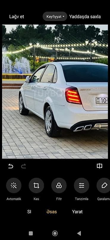 traxtor satisi: Daewoo Gentra sedan – ağ rəng, şəhər və magistral üçün universal rahat — 1