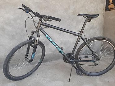 dağ velosipedi: Specialized markalı dağ/şəhər tipli velosiped. Qara rəngli çərçivəyə — 3