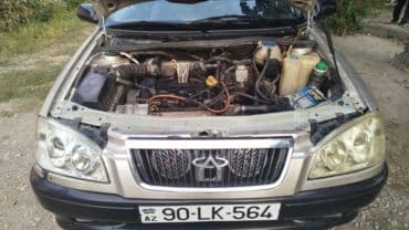 s class yan guzguleri: Chery Amulet sedan - Kuzov: 4 qapılı sedan, gümüşü rəng - Yan — 4