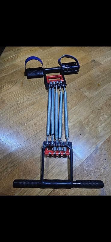 Evdə məşq üçün çoxfunksiyalı rezin yaylı fitnes trenajoru. bir purjumu