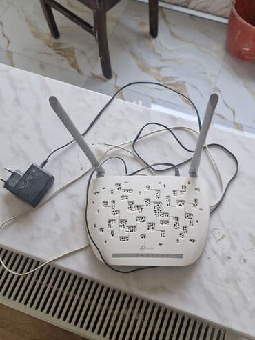 modem outdoor: TP-Link istehsalı olan bu simsiz router, yüksək sürətli internet — 2
