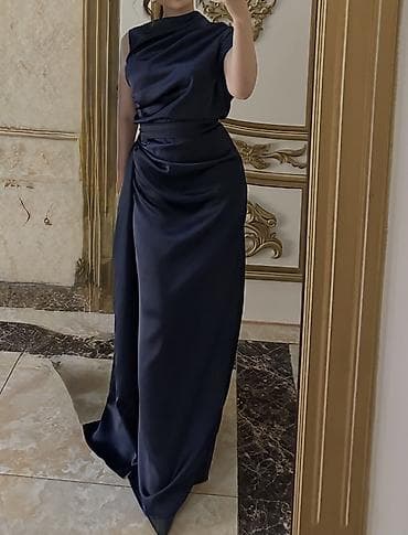 Gecə mavisi atlas uzun ziyafət geyimi.1 dəfə geyinilib.Parçası bahalı