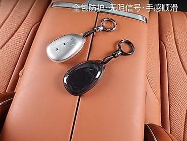 Changan Q07 açarı üçün tam örtülü silikon qoruyucu qab və asqı dəsti