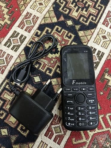 телефон fly phone: Fmobile K16 düyməli mobil telefon Xüsusiyyətlər: - Kompakt korpus — 2