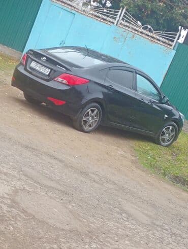 volkswagen 3 2: Hyundai Solaris sedan - Korpus: 4 qapılı sedan, qara rəng - Mühərrik — 5