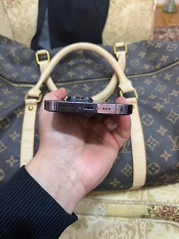 7 ci nesil ipad: IPhone 14 Pro, Deep Purple, Face ID — 1