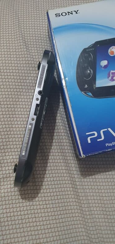 psp vita qiymeti: Sony ps vita 16 gb kart, fifa 15 oyun, qutu adapter, şnur hamısı — 5