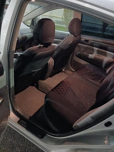 gaz 53 matoru: Toyota Prius (2-ci nəsil) hibrid hetçbek Yevropeyka. Tekerler Teze — 9