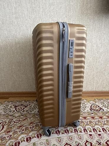 LODE brendinin qızılı rəngdə sərt korpuslu səyahət çamadanı L razmer — 4