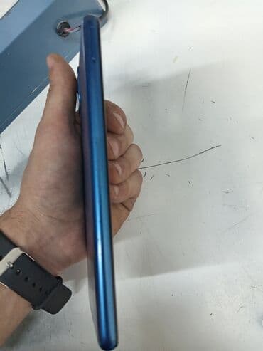 notbuk islenmis: Samsung Galaxy A12, 4 GB, rəng - Göy, Barmaq izi — 4