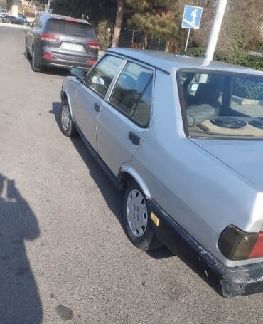 tofaş satış: Tofaş Şahin/Doğan (sedan) – gümüşü rəng Xüsusiyyətlər: - Kuzov: 4 — 8