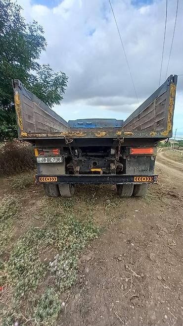 satisda olan traktorlar: MAZ dumper yük maşını - Marka/model: MAZ (ön paneldə MAZ emblemi) - — 2