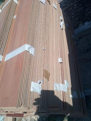 Tahirə xanım . Laminat 200 kv yaxin 2 rəngdir bir kv 7.50 man satılir — 4