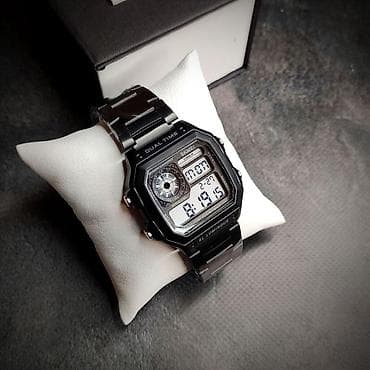 saat armani: Əsas Özəllikləri: • İkili Zaman (Dual Time): Eyni anda iki fərqli saat — 1