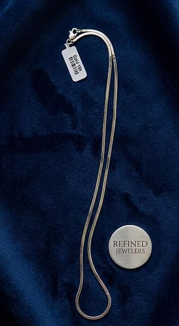 ağ qızılın qiyməti: Boyunbağı — 1