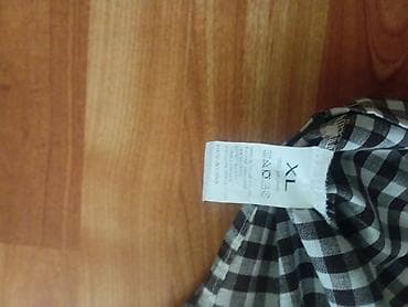 şəkilli qadın maykaları: Qara-ağ dama naxışlı qadın köynəyi. Koynək 1 defe geyinilib razmer xl — 3
