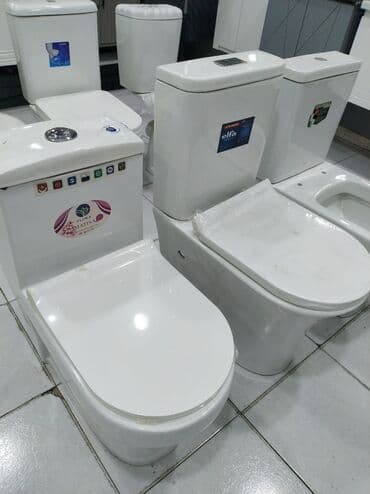 Moydadırlar: Ağ rəngli keramika tualet qabı. Tualet qabları müxtəlif formalarda və